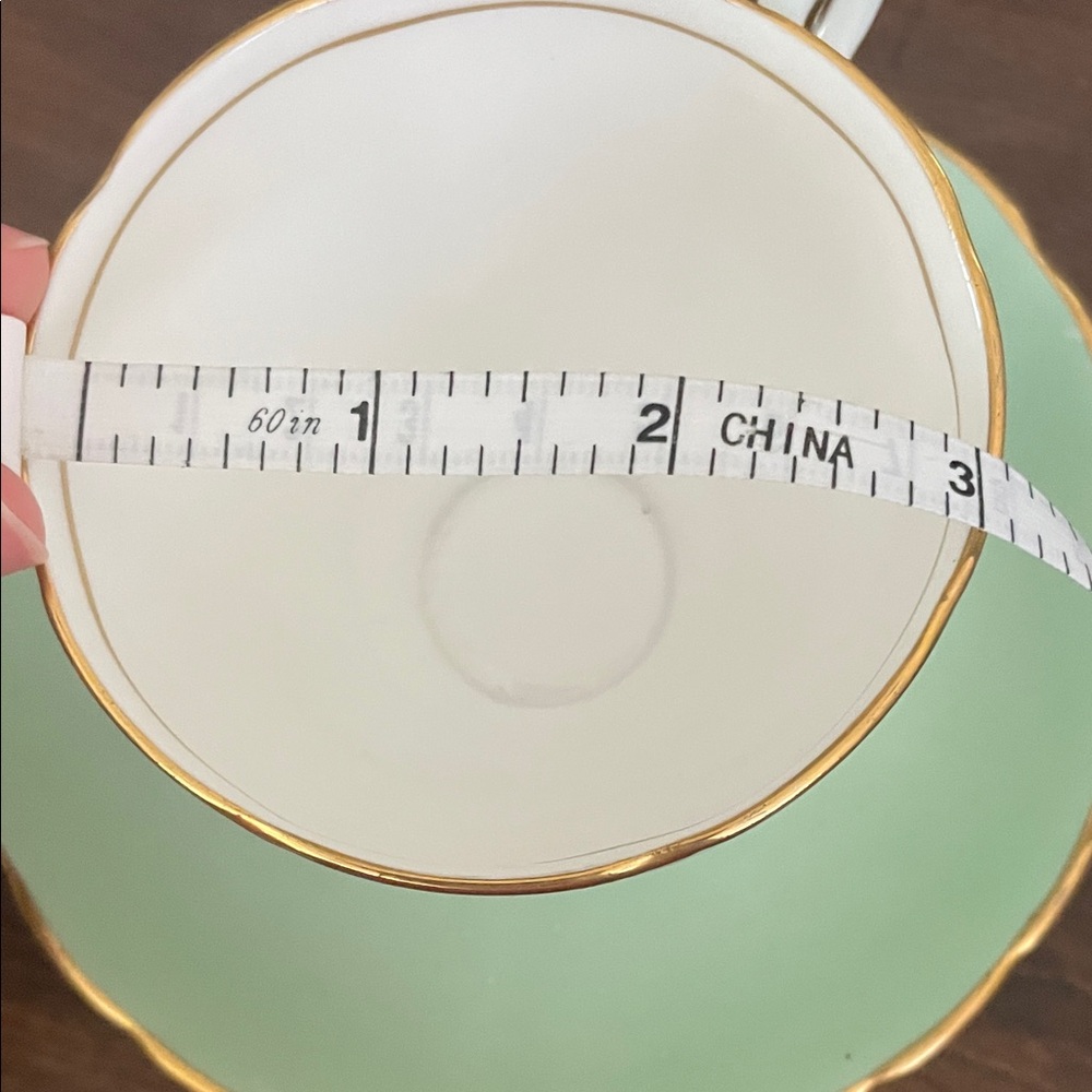 Elegant Gold-Trimmed Teacup and Saucer Set - Picture 5 of 6